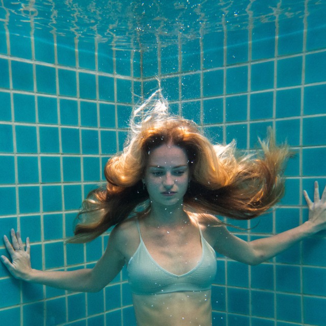 Underwater pool scene showing drowning safety hazard concerns
