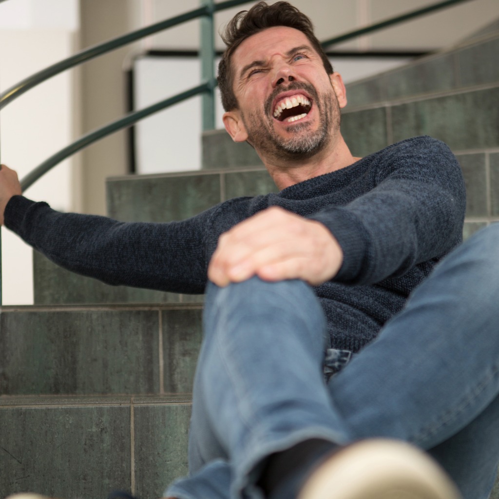Injured person after a fall on stairs