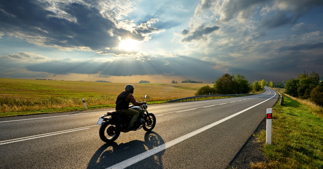 Motorcyclist riding on an open highway
