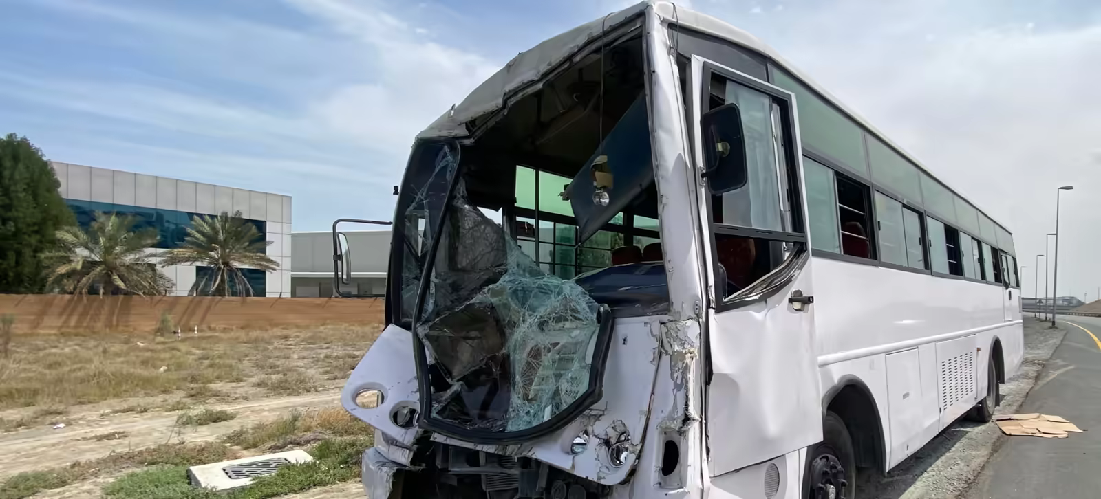Damaged party bus after a roadway crash